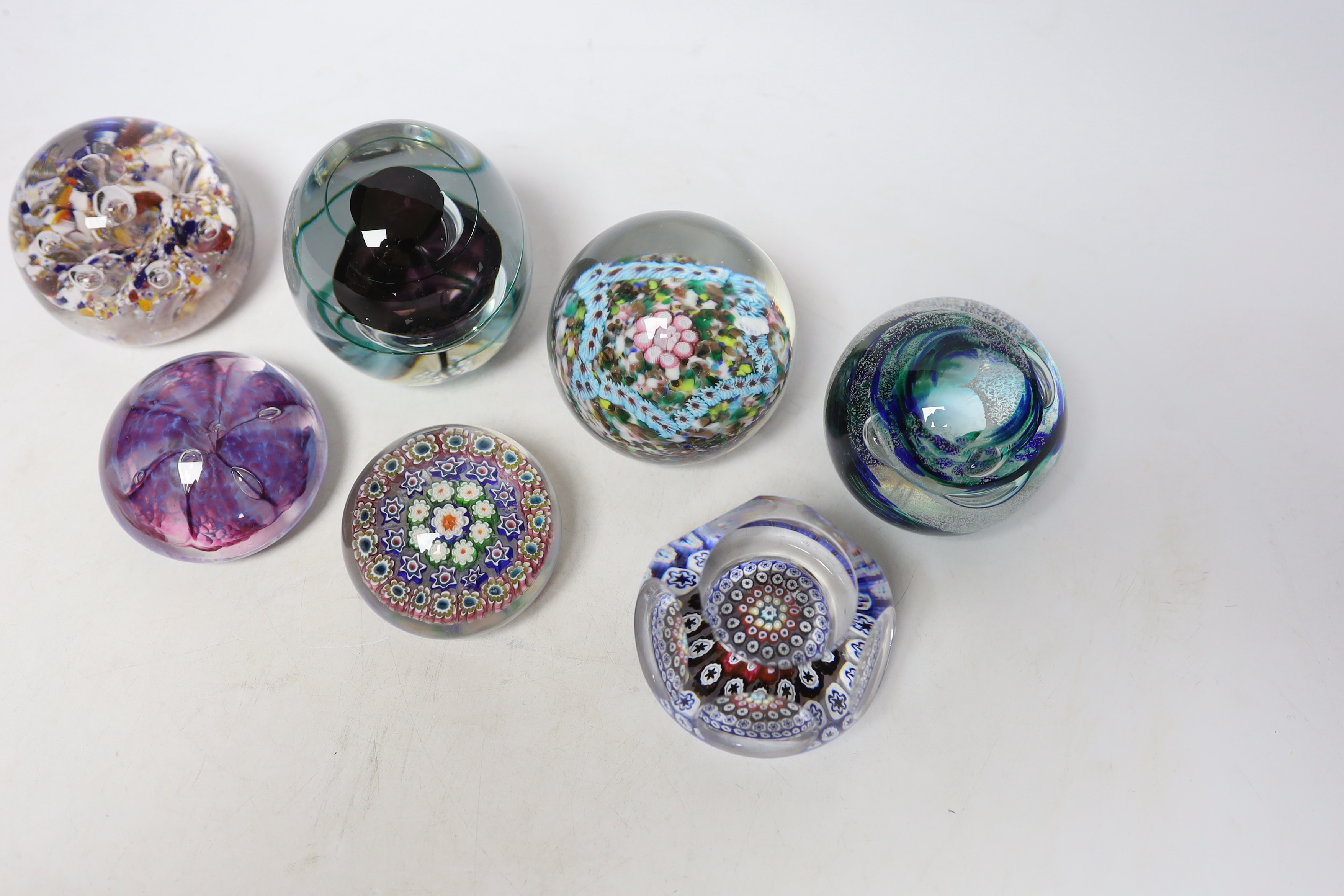 A group of seven Whitefriars and other paperweights, tallest 9cm high